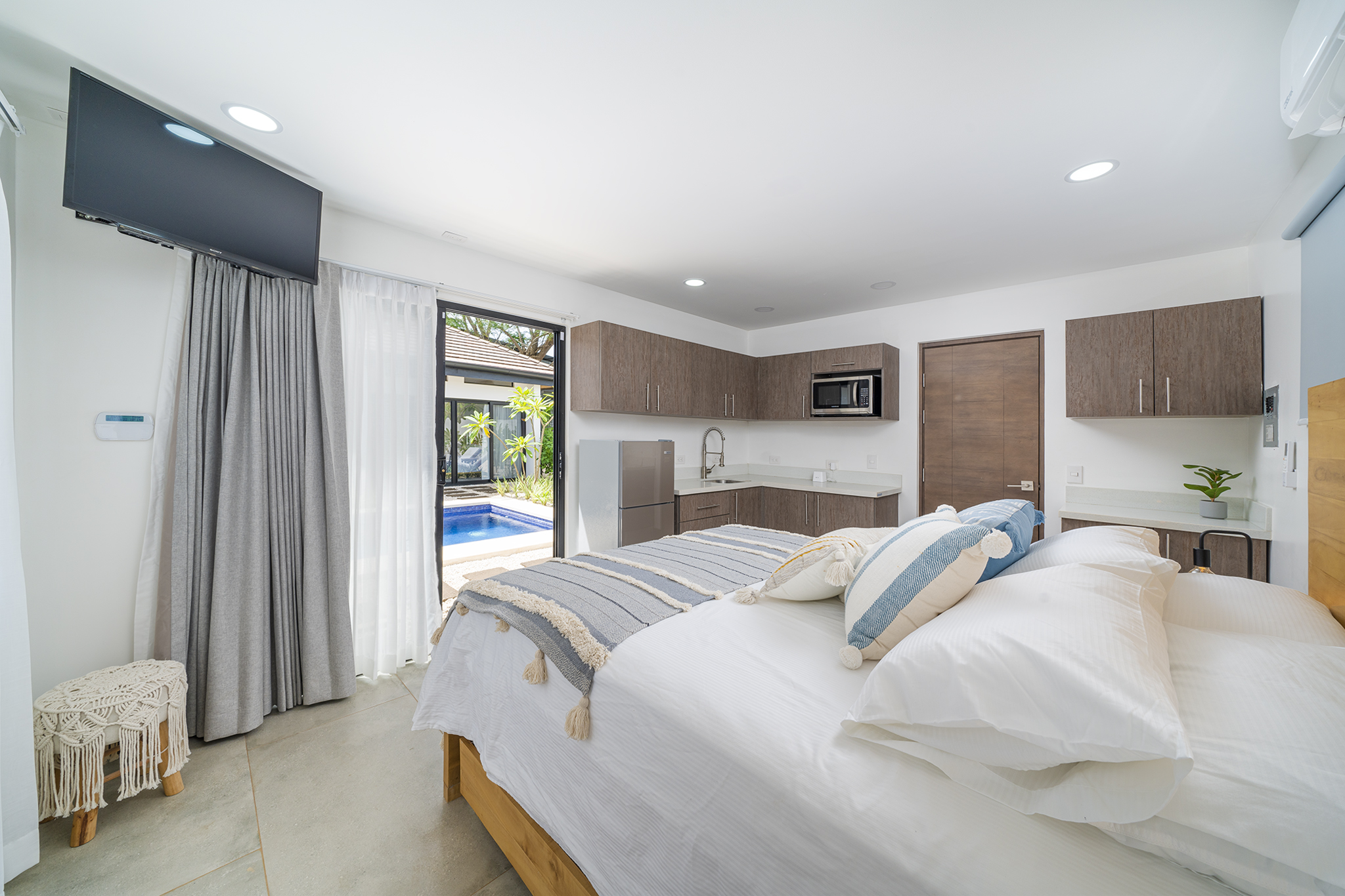 Casita — studio with kitchenette and pool view